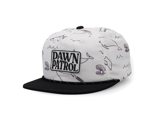 5-panel baseball hat with Rubber Dawn Patrol Patch, Black Brim and Button, Black and White Rope- Hat Facing left